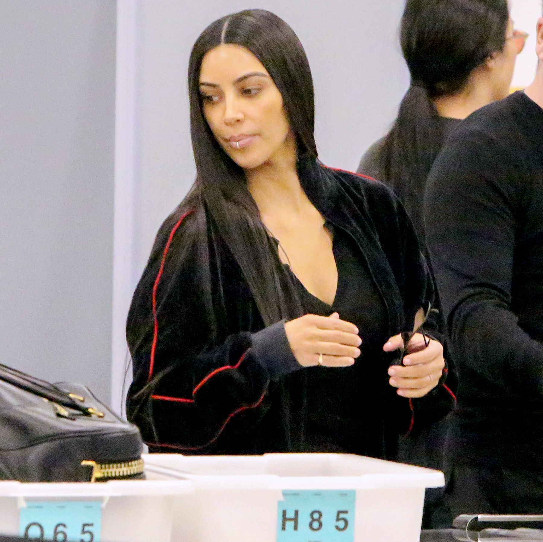 Kim Kardashian catches a flight out of LAX with Scott Disick headed to Dubai January 11, 2017. Juliano/X17online.com