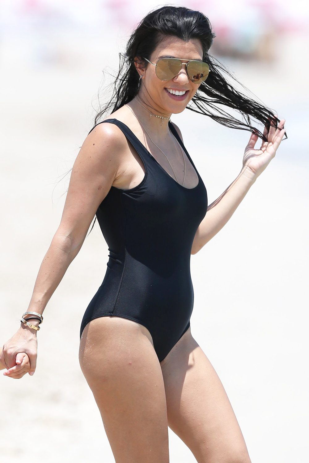 Kourtney Kardashian Displays Revenge Body in Chic One-Pieces