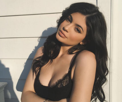 Kylie Jenner Showcases Cleavage in Black Bra Snaps