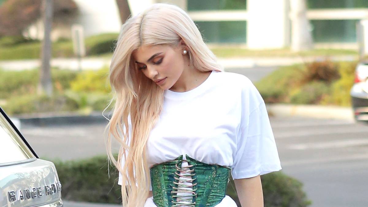 Kylie Jenner, Kim Kardashian in Corset Over T-Shirt: Photos