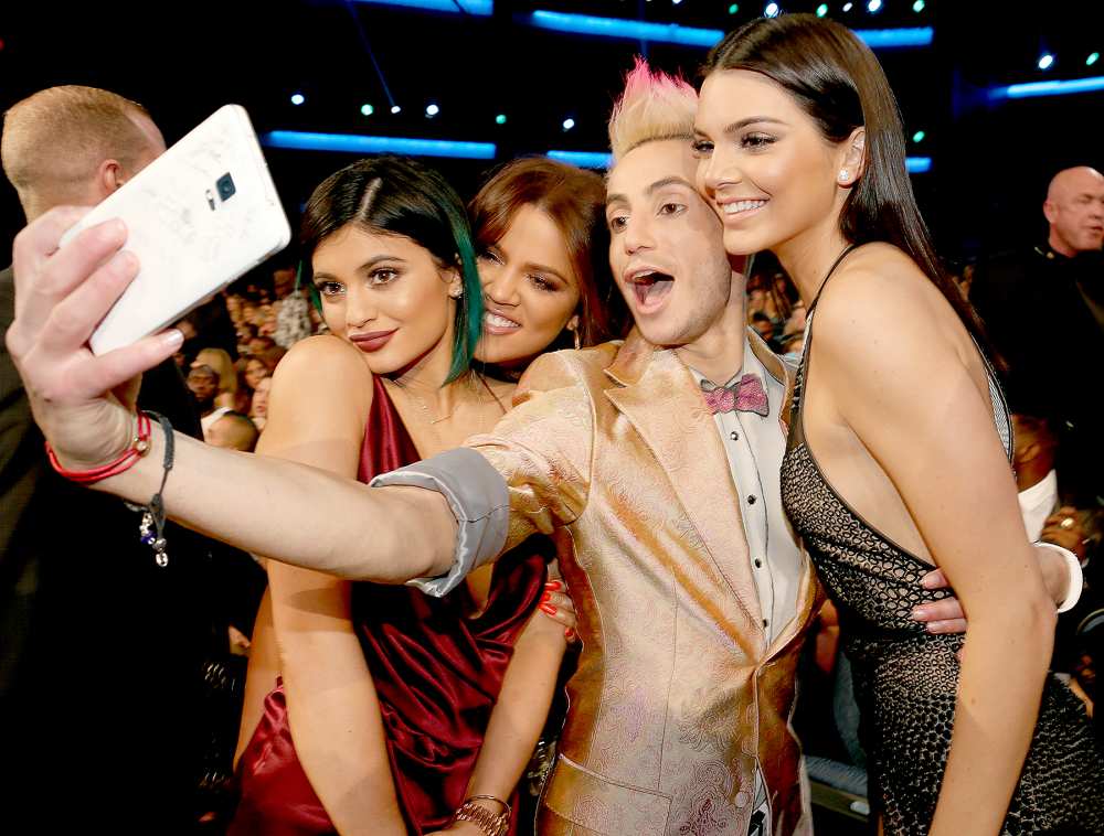Kylie Jenner, Khloe Kardashian, Frankie J. Grande, and Kendall Jenner take a selfie at the 2014 American Music Awards at Nokia Theatre L.A. Live on November 23, 2014 in Los Angeles, California.