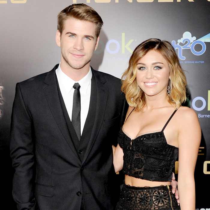 Liam Hemsworth and Miley Cyrus arrive at the premiere of Lionsgate's 'The Hunger Games' in 2012.