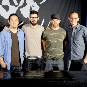 Mike Shinoda, Rob Bourdon, Joe Hahn, Brad Delson, Dave 'Phoenix' Farrell and Chester Bennington of Linkin Park are inducted into the Rockwalk at Guitar Center on June 18, 2014 in Hollywood, California.