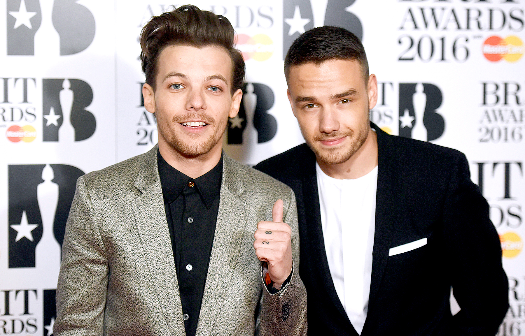 Louis Tomlinson and Liam Payne attend the BRIT Awards 2016 at The O2 Arena on February 24, 2016 in London, England.