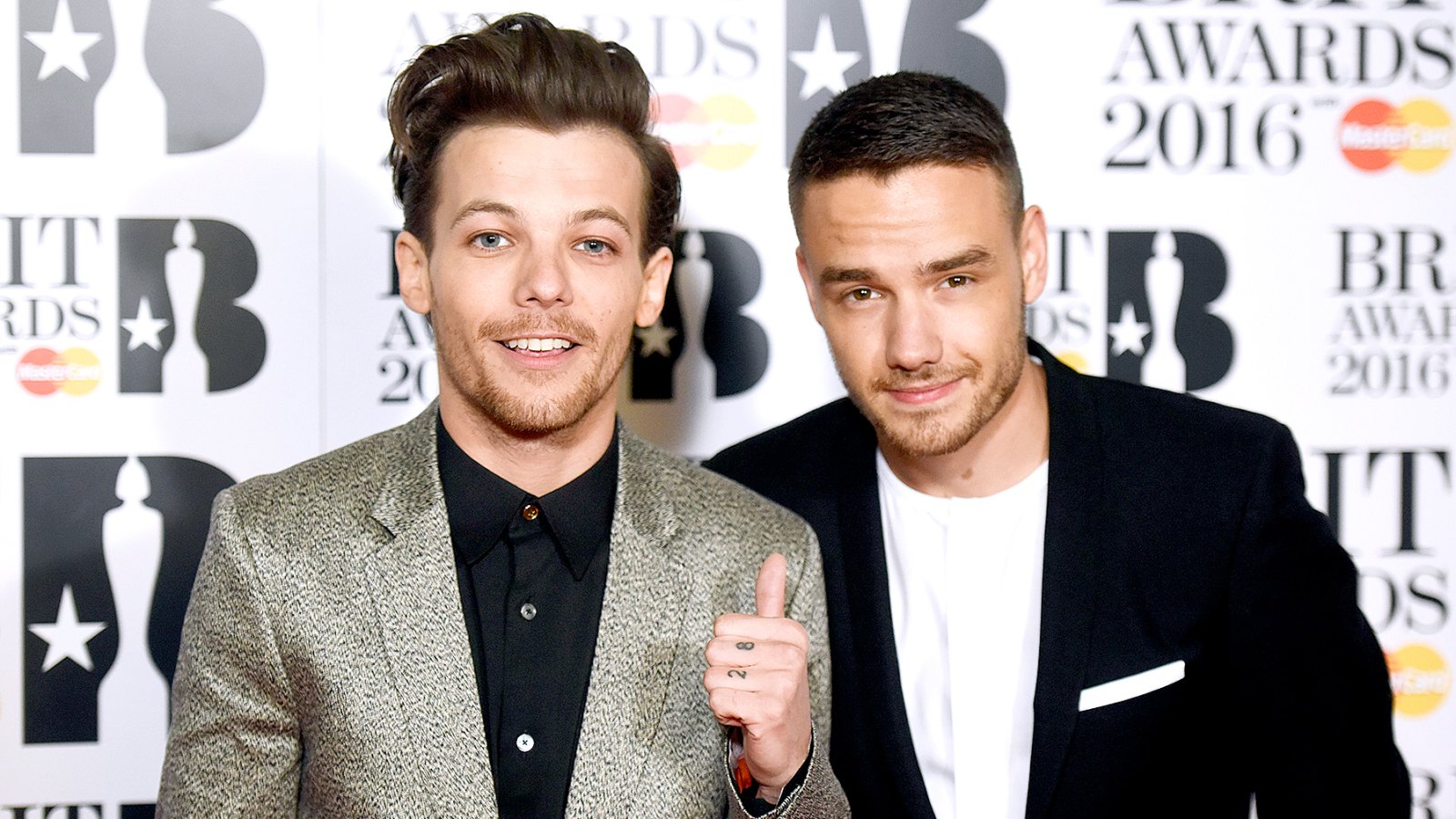 Louis Tomlinson and Liam Payne attend the BRIT Awards 2016 at The O2 Arena on February 24, 2016 in London, England.