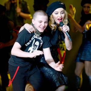 Rocco Ritchie and Madonna perform on stage during her "MDNA" tour at Ramat Gan Stadium on May 31, 2012 in Tel Aviv, Israel.