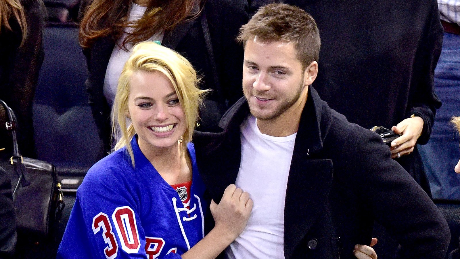 Margot Robbie and Tom Ackerley attend the Arizona Coyotes vs New York Rangers game at Madison Square Garden in New York City on February 26, 2015.