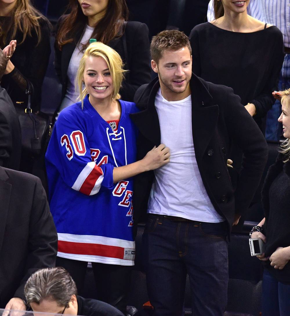 Margot Robbie and Tom Ackerley attend a New York Rangers Game in 2015