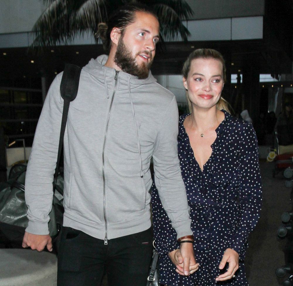 Margot Robbie and Tom Ackerley are seen at LAX on January 02, 2017 in Los Angeles, California.