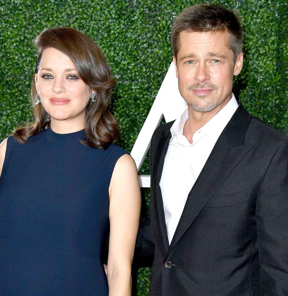 Marion Cotillard and Brad Pitt arrives at the Fan Event For Paramount Pictures'