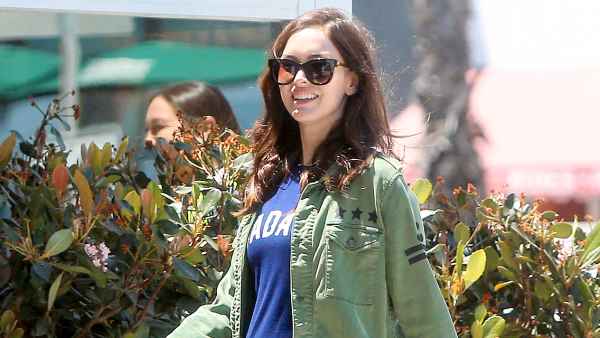 Megan Fox sports a growing baby bump while spotted out amid news she and husband Brian Austin Green are expecting their third child together.