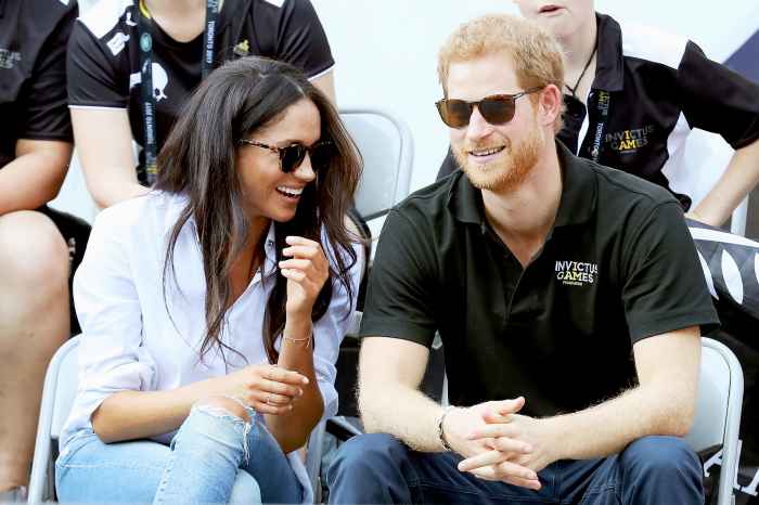 Prince Harry and Meghan Markle attend a Wheelchair Tennis match during the Invictus Games 2017 at Nathan Philips Square in Toronto on September 25, 2017.