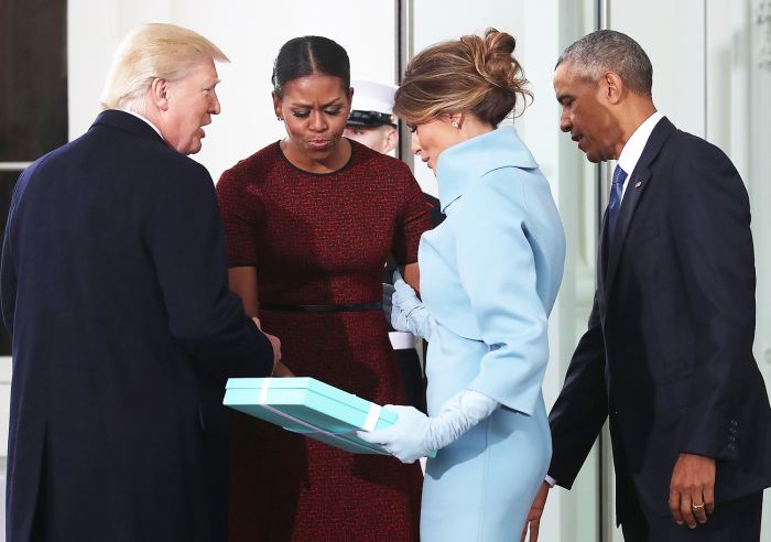 Donald Trump,and Melania Trump, are greeted by President Barack Obama and his wife first lady Michelle Obama, upon arriving at the White House on January 20, 2017 in Washington, DC.