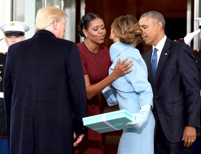 Donald Trump and his wife Melania Trump are greeted by Barack Obama and Michelle Obama, upon arriving at the White House on January 20, 2017 in Washington, DC.