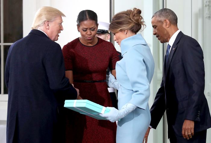 Donald Trump and his wife Melania Trump are greeted by Barack Obama and Michelle Obama, upon arriving at the White House on January 20, 2017 in Washington, DC.