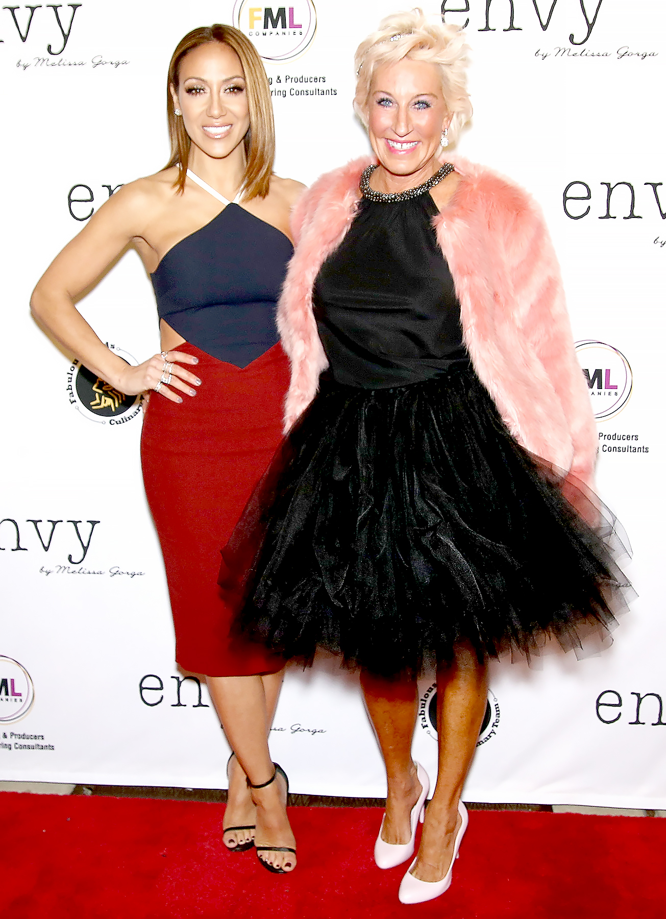 Melissa Gorga (L) and Jackie Beard Robinson attend the grand opening of envy by Melissa Gorga Boutique at envy by Melissa Gorga Boutique on January 14, 2016 in Montclair, New Jersey.