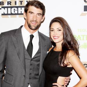 Michael Phelps and Nicole Johnson arrive at Muhammad Ali's Celebrity Fight Night XXIII at the JW Marriott Phoenix Desert Ridge Resort & Spa on March 18, 2017 in Phoenix, Arizona.