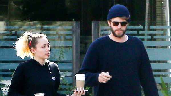Miley Cyrus and Liam Hemsworth exit Ollo restaurant in Malibu with some friends following lunch.