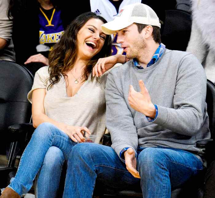 Mila Kunis and Ashton Kutcher attend a basketball game between the Oklahoma City Thunder and the Los Angeles Lakers at Staples Center on December 19, 2014 in Los Angeles, California.
