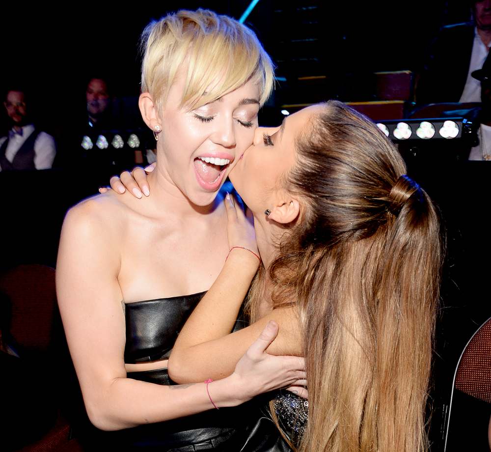 Miley Cyrus and Ariana Grande attend the 2014 MTV Video Music Awards at The Forum on August 24, 2014 in Inglewood, California.