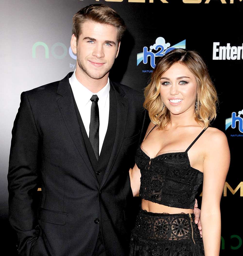 Liam Hemsworth and Miley Cyrus attends "The Hunger Games" Los Angeles Premiere on March 12, 2012 in Los Angeles, United States.