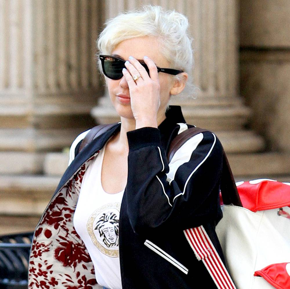 Miley Cyrus shows off engagement ring while out on a walk around the Soho Neighborhood in Manhattan.