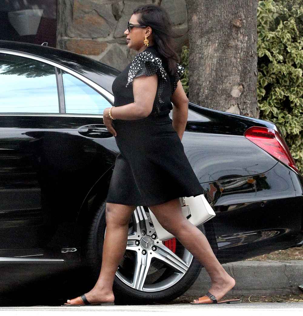 Pregnant Mindy Kaling shows off her growing baby bump in Los Angeles on September 3, 2017.