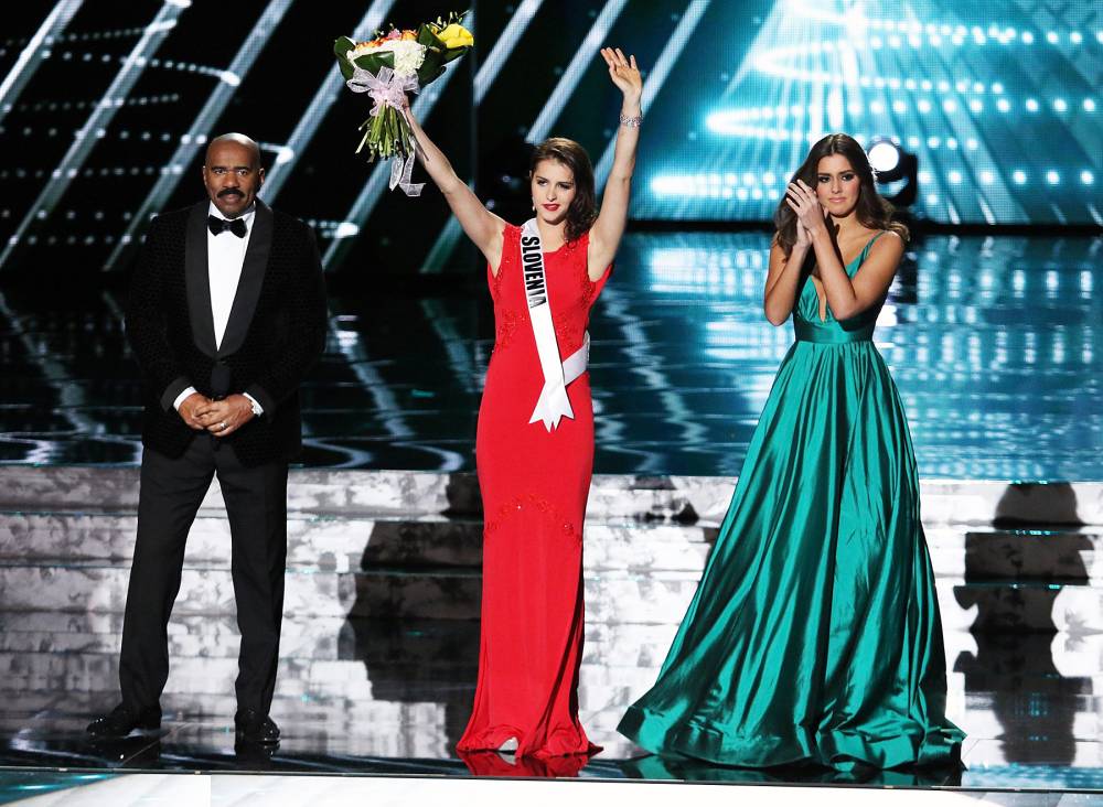 Steve Harvey, Miss Slovenia Ana Halozan and Paulina Vega onstage at the 2015 Miss Universe Pageant