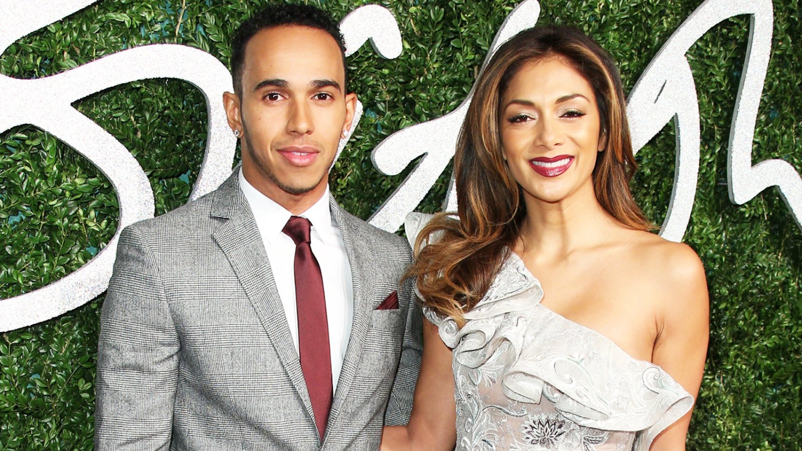 Lewis Hamilton and Nicole Scherzinger attend the British Fashion Awards at London Coliseum on December 1, 2014 in London, England.