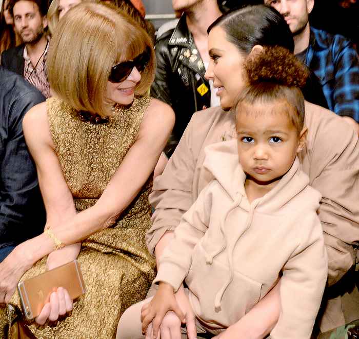 Anna Wintour, Kim Kardashian West and North West attend Kanye West Yeezy Season 2 during New York Fashion Week at Skylight Modern on September 16, 2015 in New York City.
