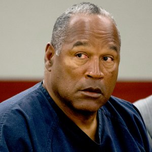 O.J. Simpson listens as his defense attorney, Ozzie Fumo, questions witness David Cook during an evidentiary hearing in Clark County District Court May 16, 2013 in Las Vegas, Nevada. Julie Jacobson-Pool/Getty Images
