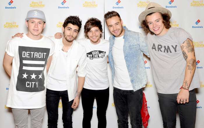 Zayn Malik, Niall Horan, Louis Tomlinson, Liam Payne and Harry Styles of One Direction pose for photographs at Wembley Arena as they made the wishes of 60 seriously ill children come true and met the children prior to performing at Wembley Stadium on June 8, 2014 in London, United Kingdom.