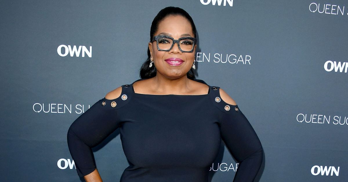 Oprah Winfrey shows off her slimmed down figure in a belted co-ord