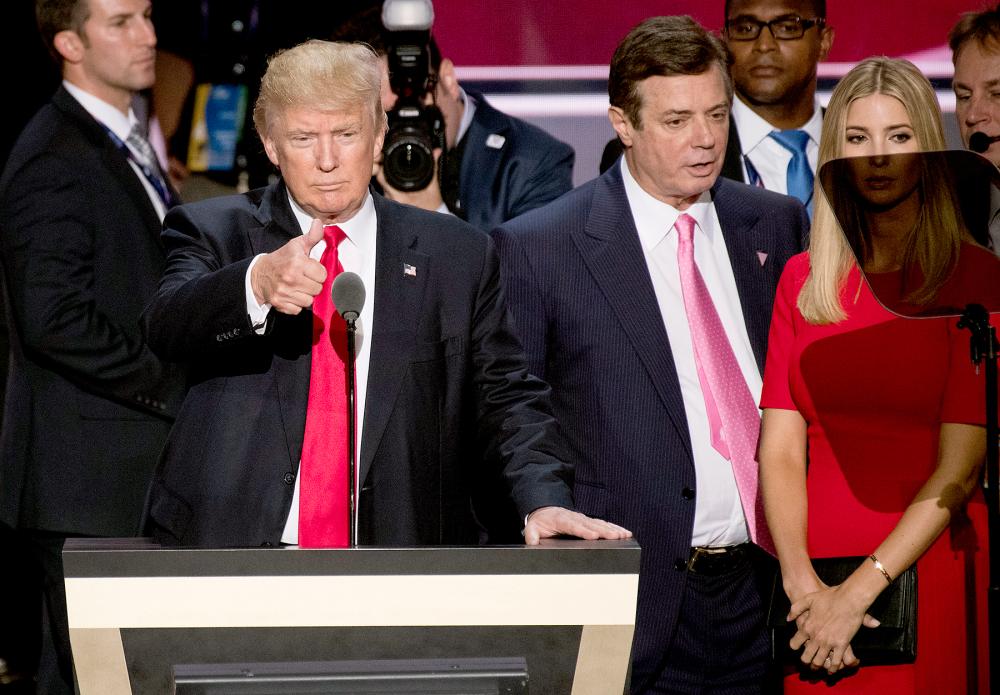 Donald Trump, flanked by campaign manager Paul Manafort and daughter Ivanka, checks the podium early Thursday afternoon in preparation for accepting the GOP nomination to be President at the 2016 Republican National Convention in Cleveland, Ohio on Wednesday July 20, 2016.