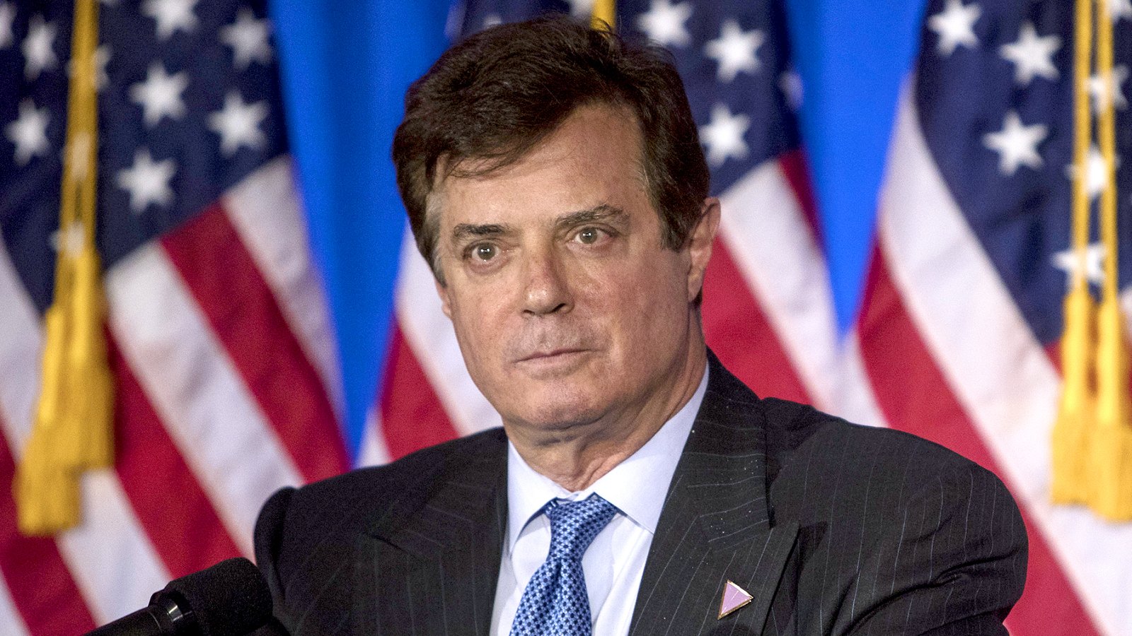 Paul Manafort stands on stage before Donald Trump, presumptive Republican presidential nominee, speaks during a primary night event at the Trump National Golf Club Westchester in Briarcliff Manor, New York, U.S., on Tuesday, June 7, 2016.
