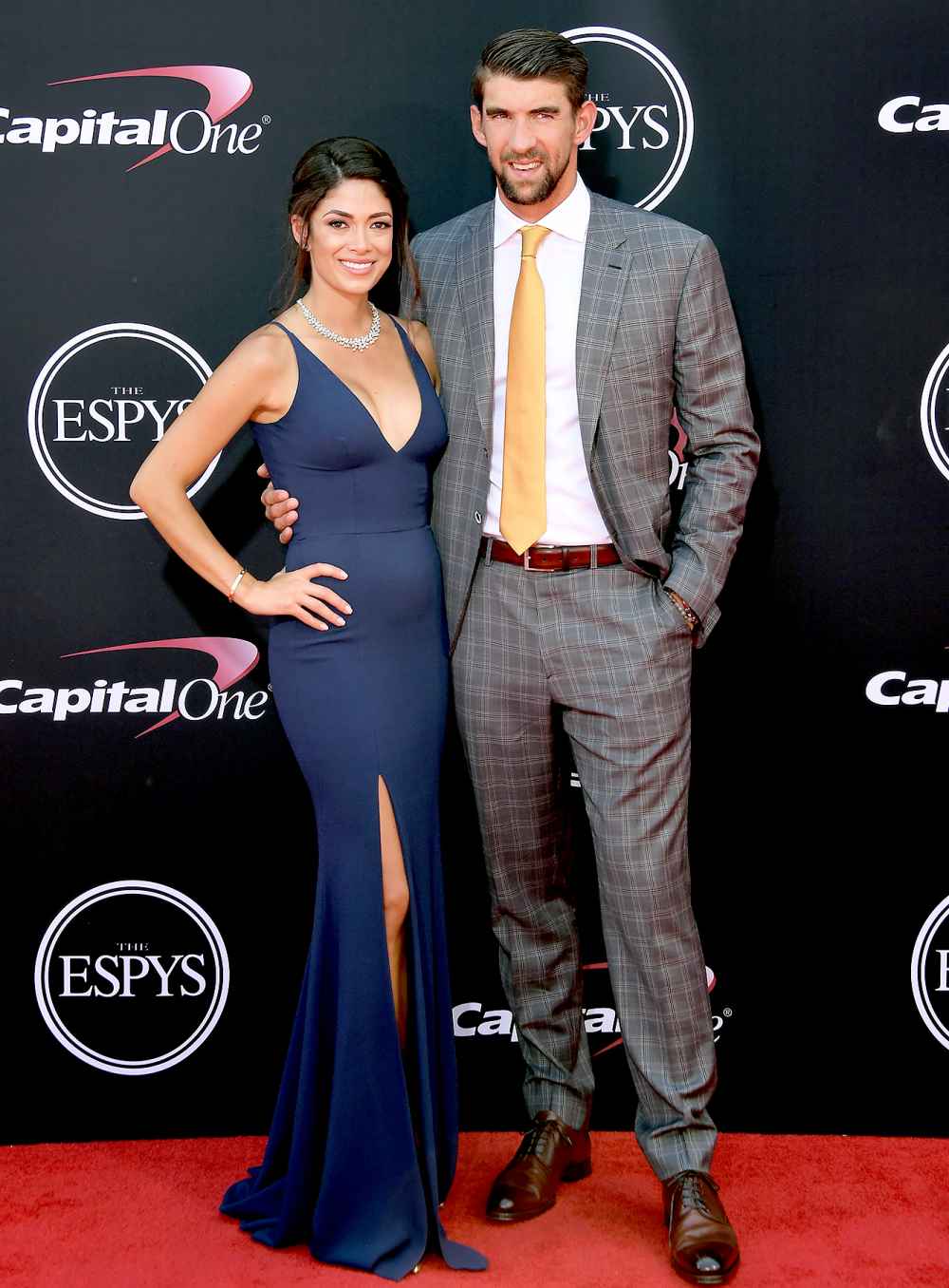 Michael Phelps (R) and Nicole Johnson attend The 2017 ESPYS at Microsoft Theater on July 12, 2017 in Los Angeles, California.