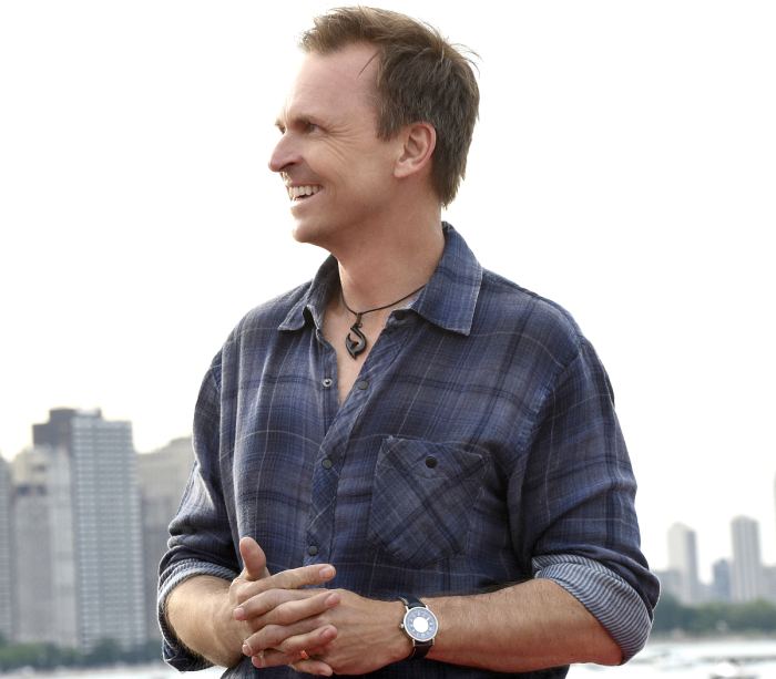 Host Phil Keoghan waits as team race to the finish line in Milton Lee III Olive Park in Chicago, Illinois on the 29th season finale of THE AMAZING RACE, Thursday, June 1.