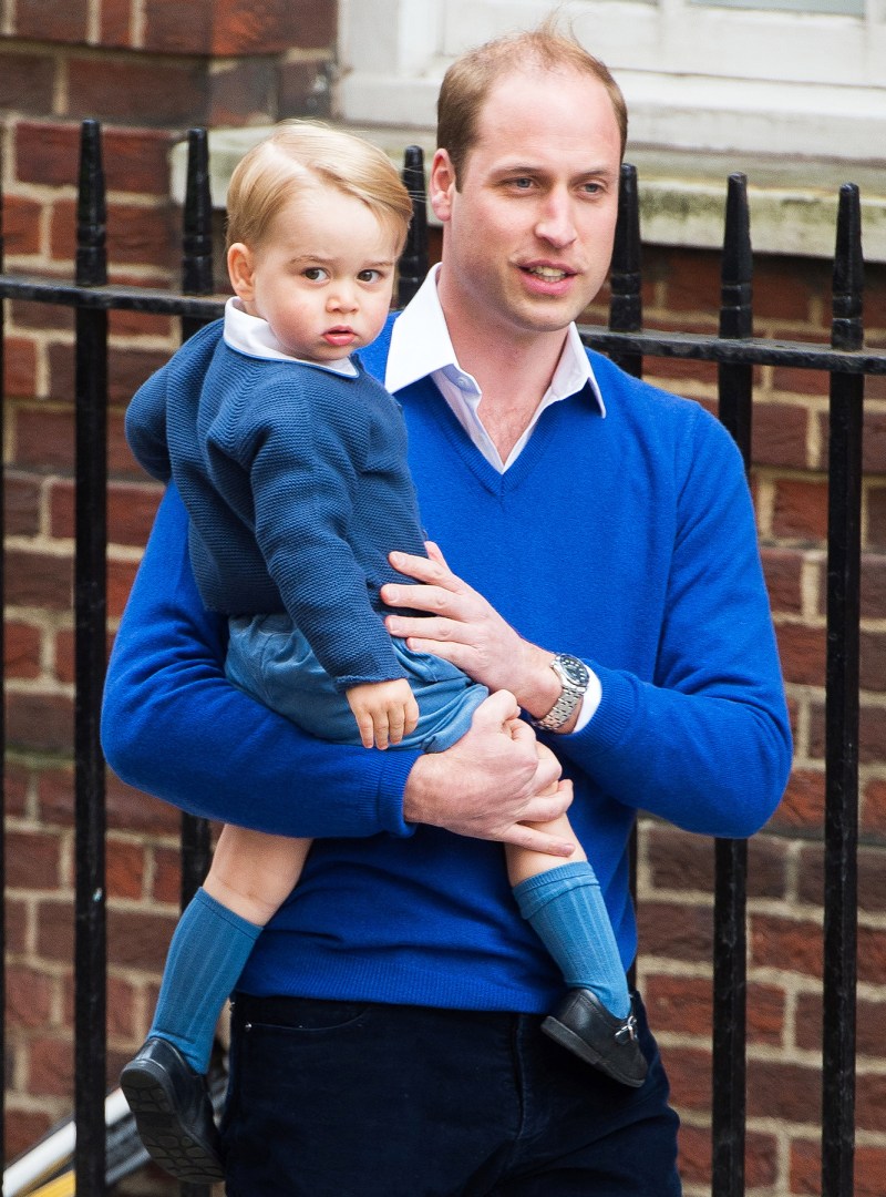Pangeran William menggendong Pangeran George