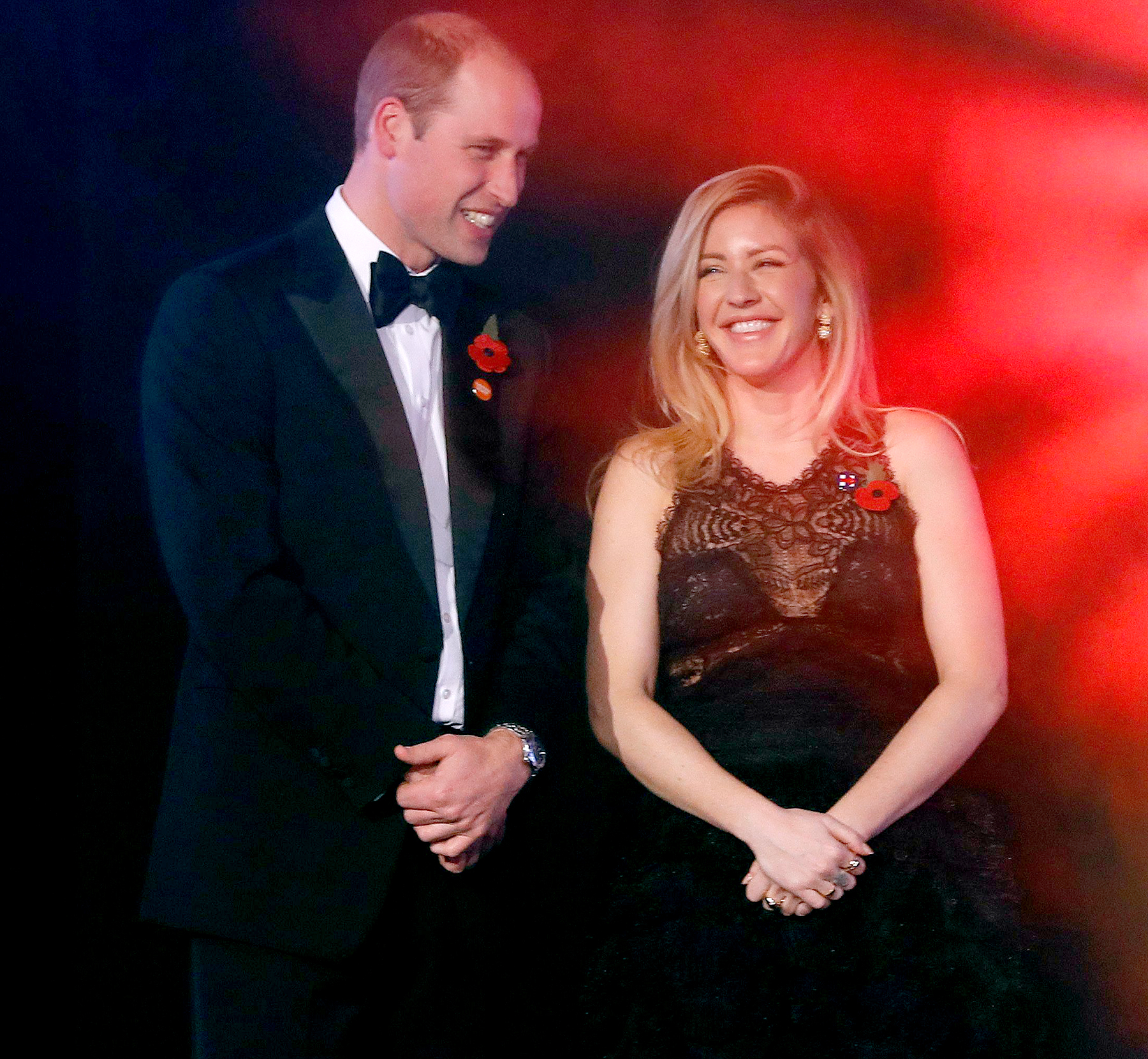 Britain's Prince William (L), The Duke of Cambridge speaks to British singer-songwriter Ellie Goulding (R) as they attend Centrepoint at the Palace, a fundraising event in the grounds of Kensington Palace in London on November 10, 2016 in aid of youth homeless charity Centrepoint.