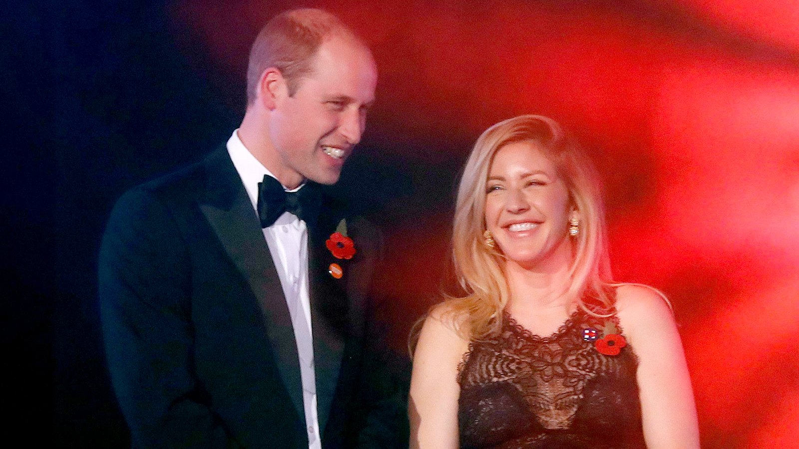 Britain's Prince William (L), The Duke of Cambridge speaks to British singer-songwriter Ellie Goulding (R) as they attend Centrepoint at the Palace, a fundraising event in the grounds of Kensington Palace in London on November 10, 2016 in aid of youth homeless charity Centrepoint.