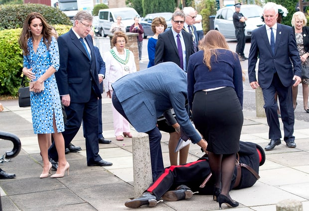 Catherine, Duchess of Cambridge looks on as Prince William, Duke of Cambridge helps up Jonathan Douglas-Hughes, vice Vice Lord-Lieutenant of Essex after his fall at Stewards Academy on September 16, 2016 in Harlow, England.