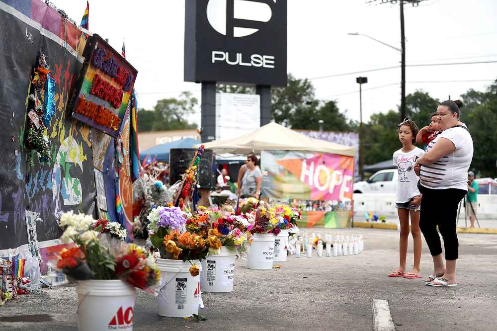 People visit the memorial to the victims of the mass shooting setup around the Pulse gay nightclub one year after the shooting on June 12, 2017 in Orlando, Florida. Omar Mateen killed 49 people at the club a little after 2 a.m. on June 12, 2016.