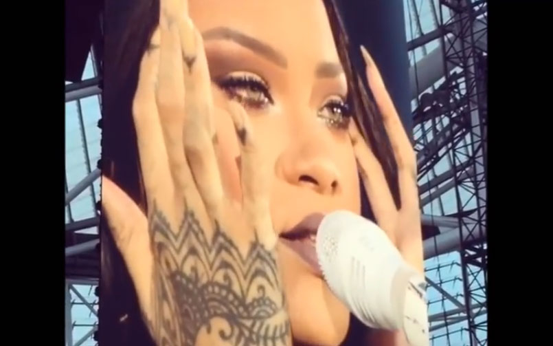 Rihanna cries on stage during a performance in Dublin, Ireland