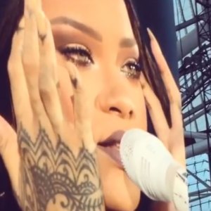 Rihanna cries on stage during a performance in Dublin, Ireland