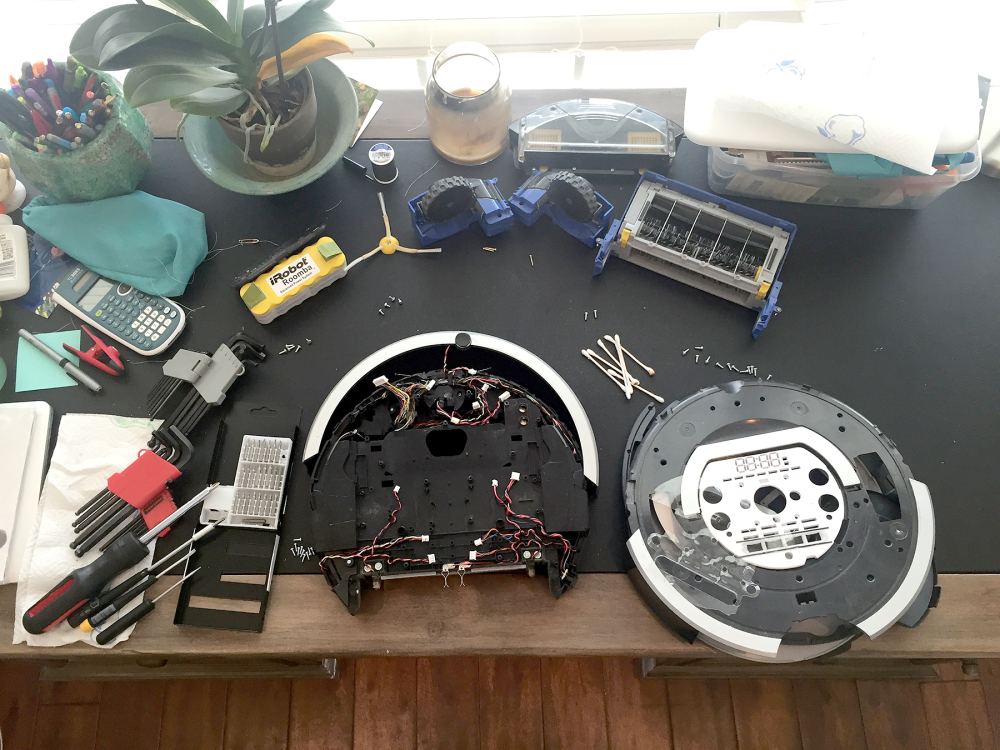 The disassembled Roomba