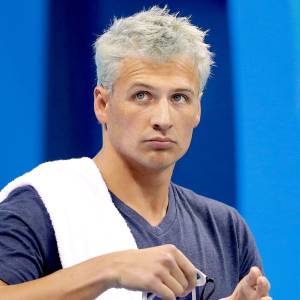Ryan Lochte prepares before a men's 4x200-meter freestyle heat during the swimming competitions at the 2016 Summer Olympics, Tuesday, Aug. 9, 2016.