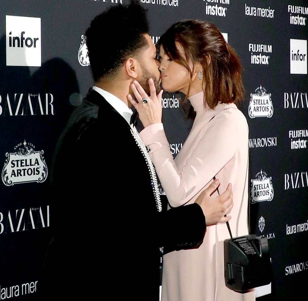 The Weeknd kisses Selena Gomez during the 2017 Harper ICONS Party at The Plaza Hotel on September 8, 2017 in New York City.