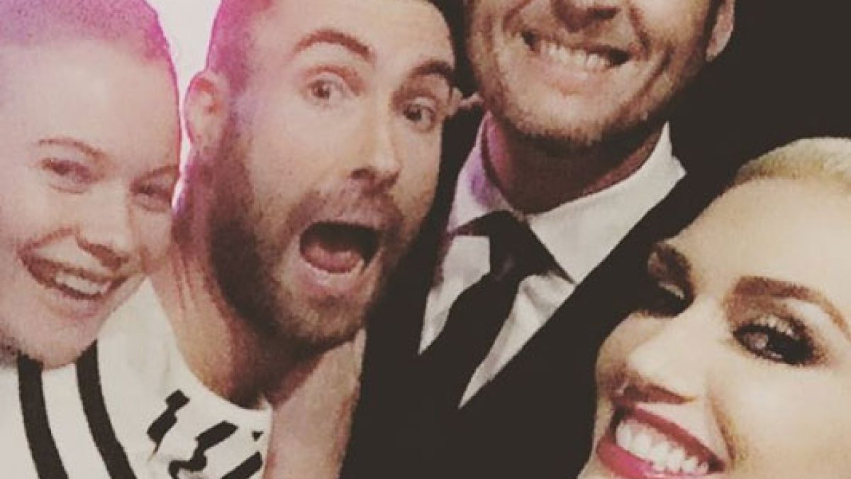 Gwen Stefani and Blake Shelton take a selfie with Adam Levine and Behati Prinsloo