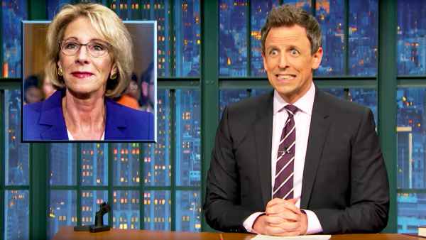 Betsy DeVos and Seth Meyers