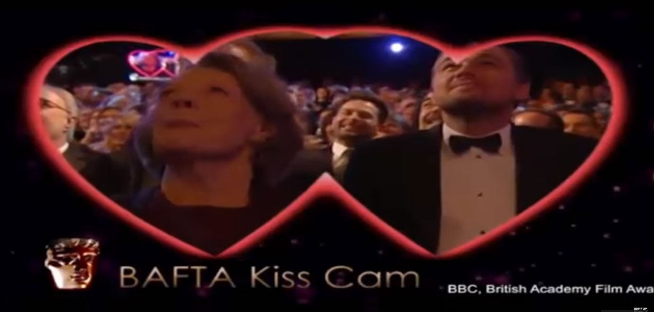 Leonardo DiCaprio and Dame Maggie Smith smooch in the BAFTA kiss cam